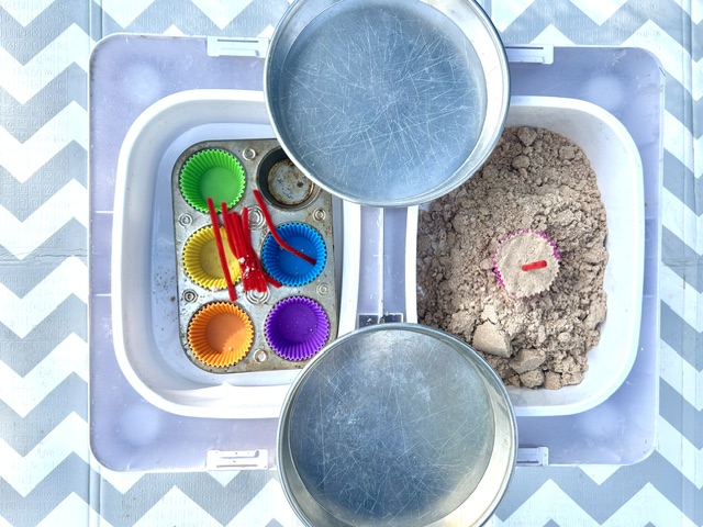 Sensory bin with sand, sieves and muffin tin