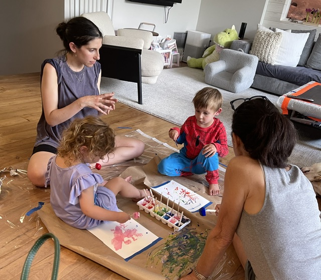 Rachel guiding families painting