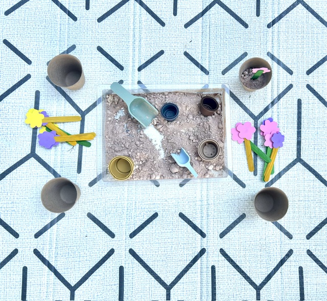 Overhead view of a miniature garden sensory tray