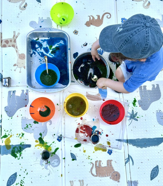 Overhead view of blue and black paint mixing station